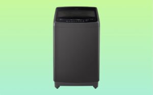 Black LG top load washing machine displayed against a green background, showcasing its sleek design and modern features.
