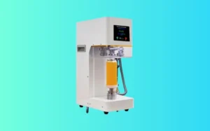 A machine designed for mixing and processing liquids in a manufacturing setting.
