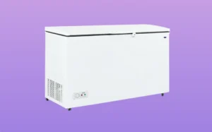 A chest freezer displayed against a purple background, showcasing its sleek design and spacious interior.