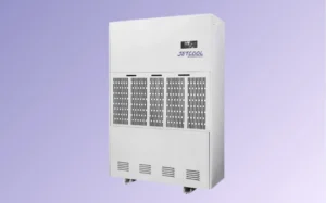 A white dehumidifier machine designed to reduce humidity in indoor spaces.