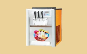 An ice cream maker machine displayed against a bright yellow background, showcasing its sleek design and features.