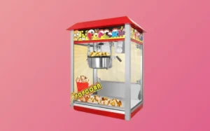 A red and white popcorn machine, showcasing its vintage design and popcorn popping inside.