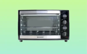 Sharp Microwave Ovens A toaster oven with the door open, showcasing its interior and cooking space.