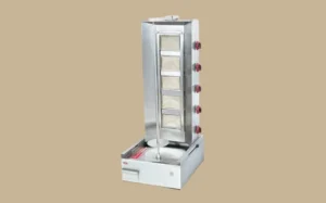 A large metal food stand featuring a prominent metal door, designed for preparing shawarma.