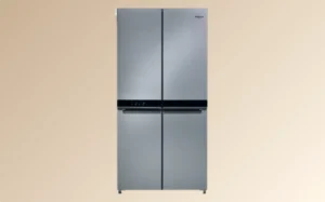 A collection of whirlpool refrigerators showcasing various models and designs in a retail display setting